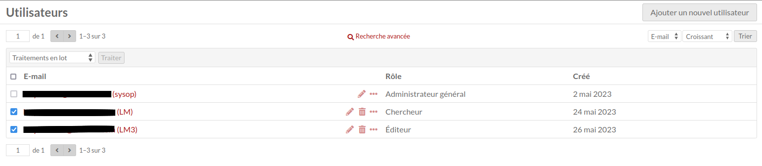 A screenshot of the users table showing only the checkboxes and email column, with three users' emails. Two of the user's boxes are checked, and the third is unchecked.